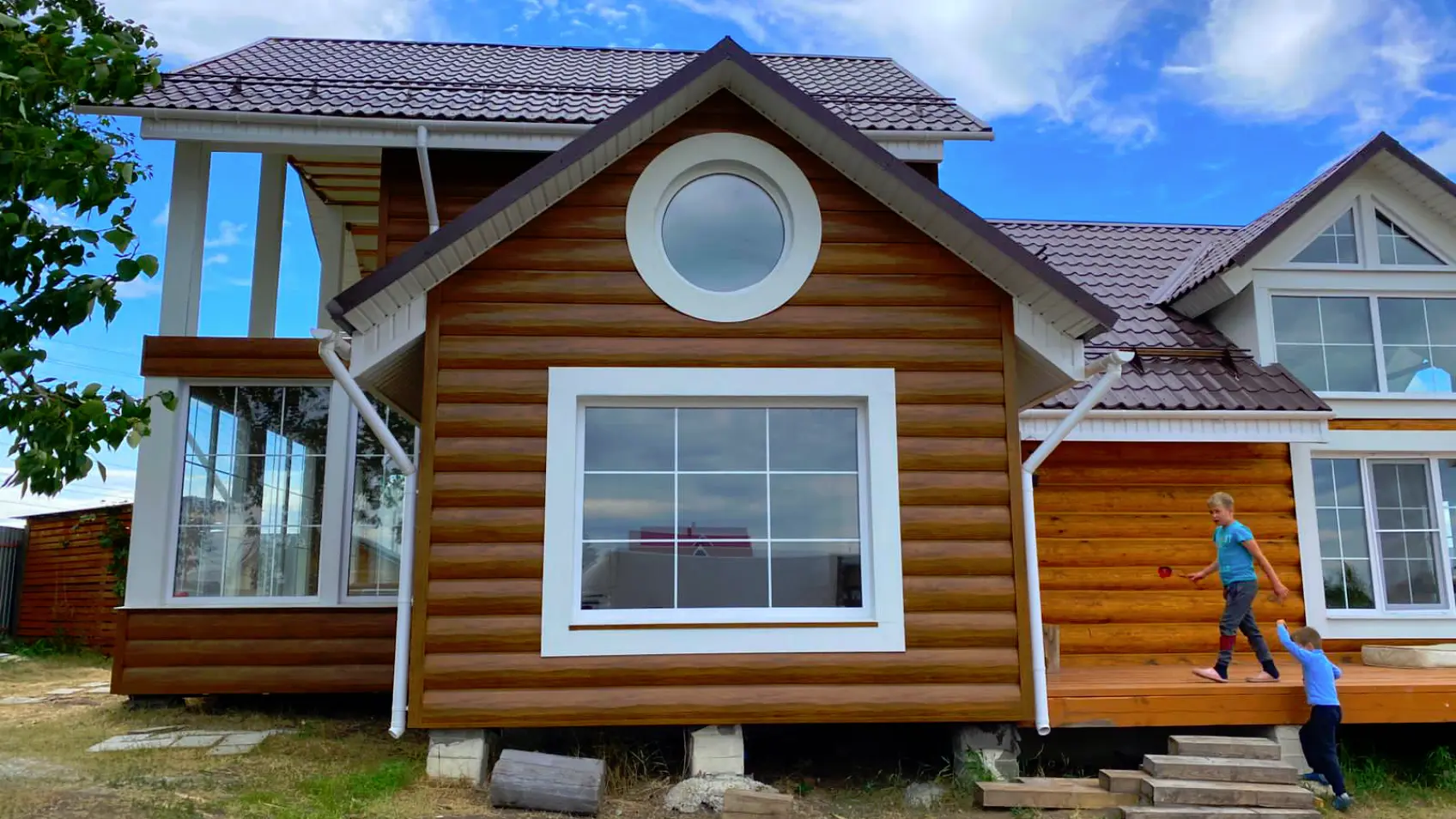 Фото 1 фасад из металлосайдинга Бревно Рубленое 4D Орех 3D Printech