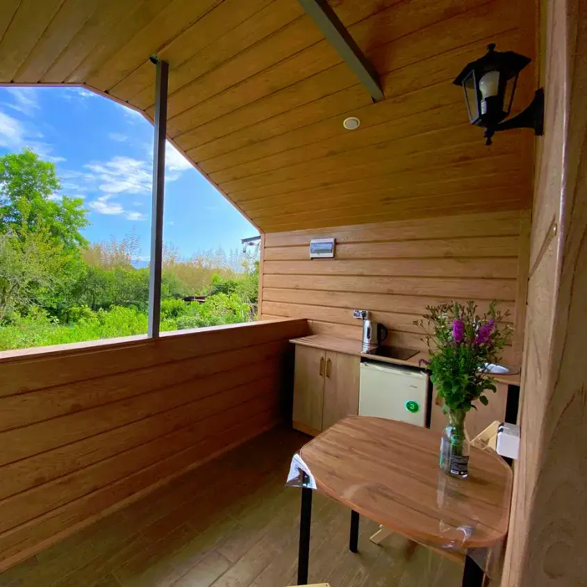 Отделка веранды сайдингом Евро-Брус под дерево Клен Светлый 3D SteelArt