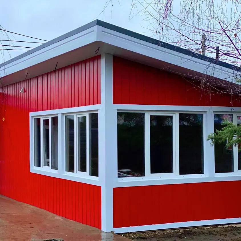 Фото 9 МеталлоСайдинг Евро-Брус под брус RAL3020 Красный вертикальный монтаж на фасаде